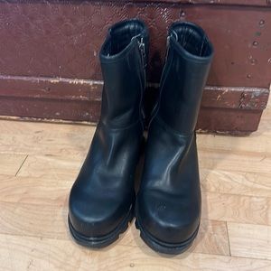 Joan of arctic wedge III moto boots.